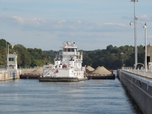 The light tow exited the upper gate, picked up the barges that had been pulled through earlier, and became a "tow" again.