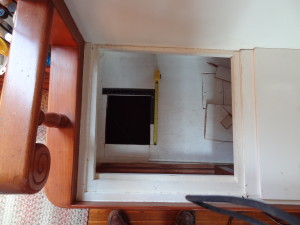 Port side access for second/inboard fuel tank located under settee