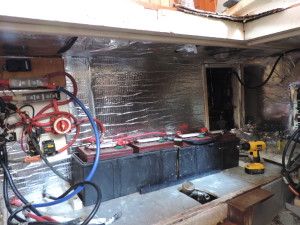 Port side engine room with bulkhead, sound deadening and electrical wiring back in place.